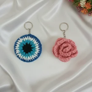 white, pink rose, evil eye crochet keychain