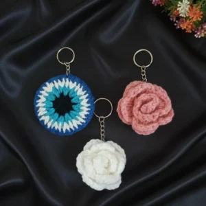white, pink rose, evil eye crochet keychain