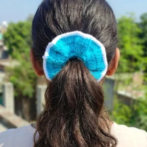 pink, maroon, and blue crochet scrunchies