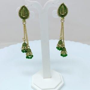 gold plated leaf studded long drop earrings black